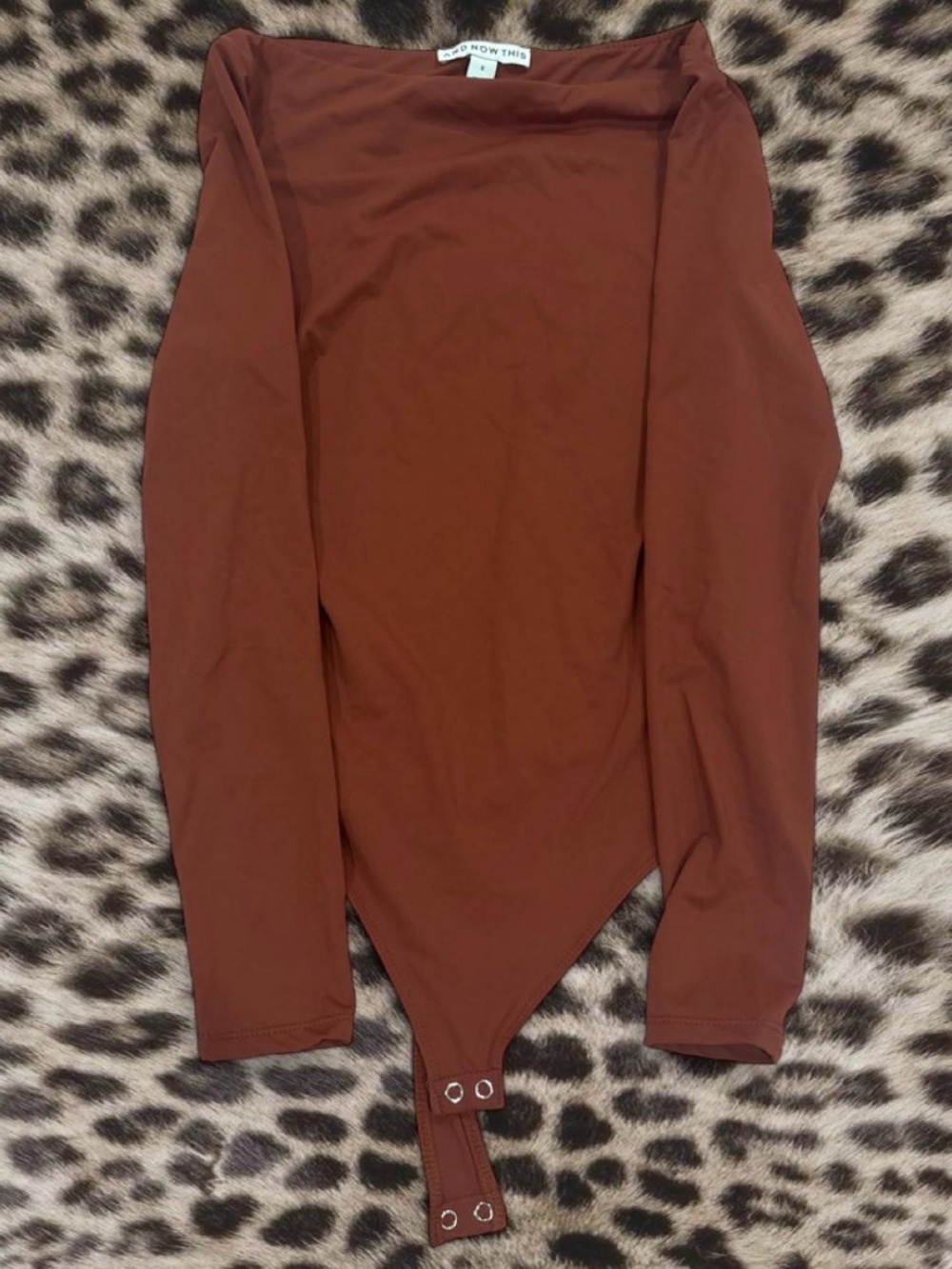 Brown long sleeved body suit in size XS